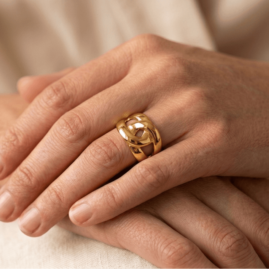 bague acier inoxydable dorée croisée