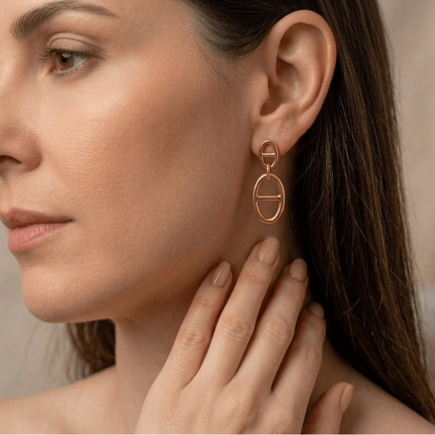Boucle d'oreille pendante dorée maille